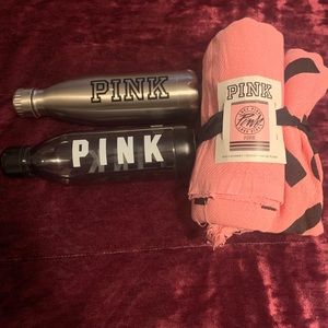 Pink beach blanket and 2 Brand new water bottles